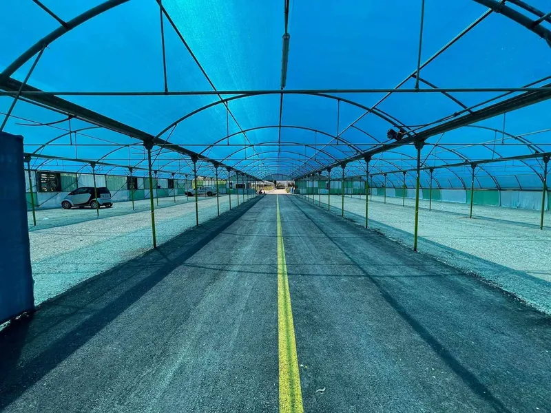 The shaded aisle with its yellow line
